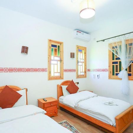 Maison D'Hotes Tinwitchi 艾济拉勒 外观 照片