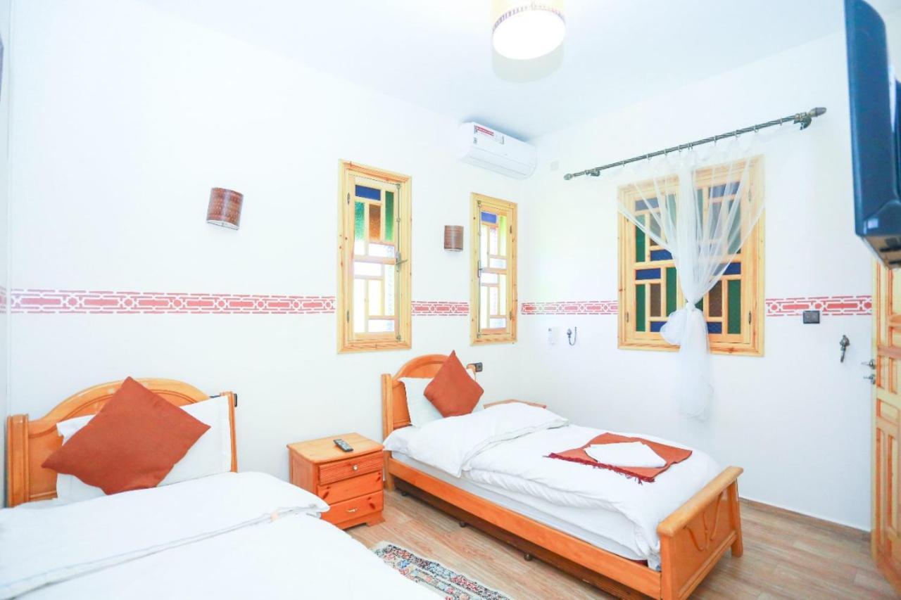 Maison D'Hotes Tinwitchi 艾济拉勒 外观 照片